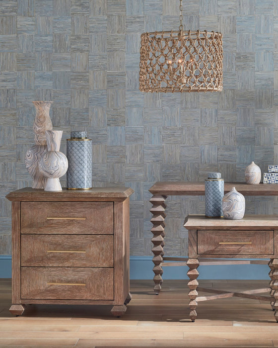 Wooden furniture set with decorative vases against a patterned wall.