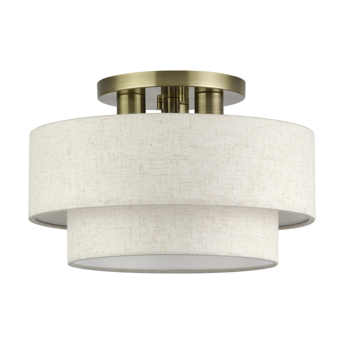 Livex Lighting - 41944-01 - Three Light Semi-Flush Mount - Manorwood - Antique Brass