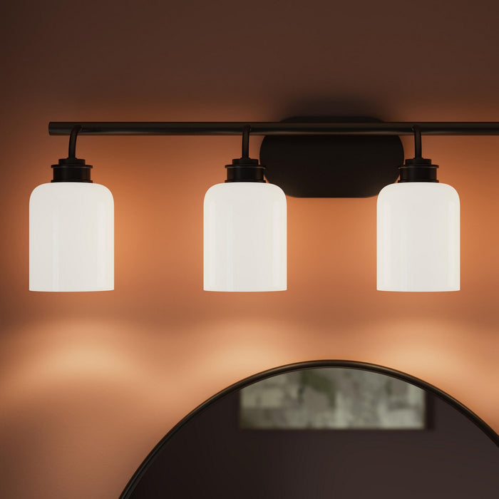 Progress Lighting - P300580-31M - Four Light Bath Vanity - Reines - Matte Black