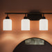 Progress Lighting - P300580-31M - Four Light Bath Vanity - Reines - Matte Black