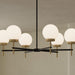 Progress Lighting - P400469-319 - Six Light Chandelier - Rigsby - Matte Black and Brushed Gold