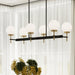 Progress Lighting - P400471-319 - Six Light Linear Chandelier - Rigsby - Matte Black and Brushed Gold
