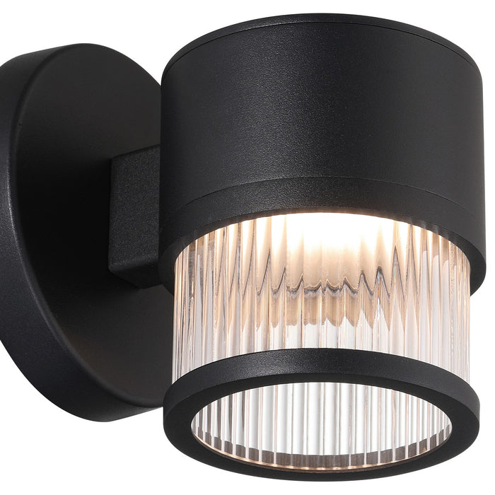 Access - 23030LEDDMG-BL/CRB - LED Outdoor Wall Mount - Ari Clear Ribbed - Black