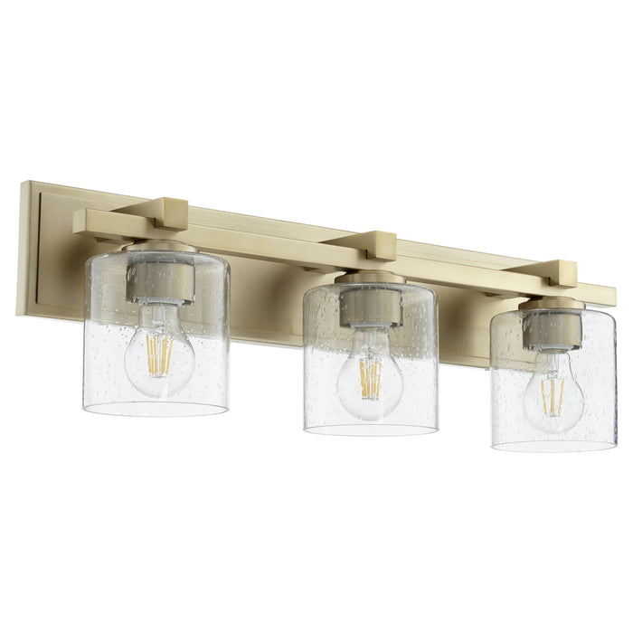 Quorum - 5369-3-280 - Three Light Vanity - Aged Brass w/ Clear/Seeded