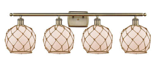 Ballston Four Light Bath Vanity Antique Brass