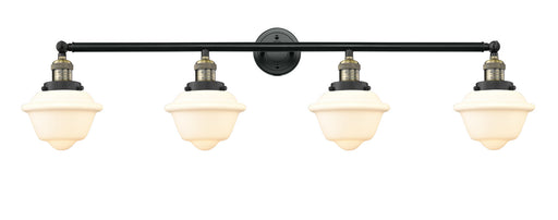 Franklin Restoration Four Light Bath Vanity Black Antique Brass
