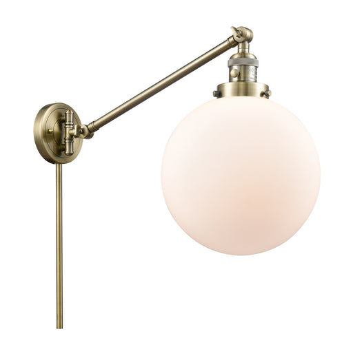 Franklin Restoration LED Swing Arm Lamp Antique Brass