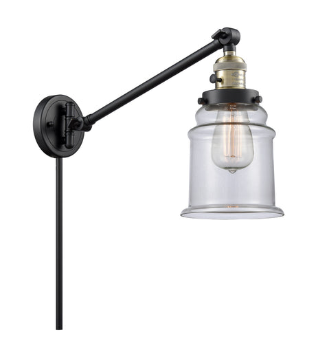 Franklin Restoration LED Swing Arm Lamp Black Antique Brass