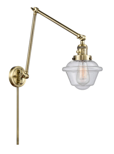 Franklin Restoration LED Swing Arm Lamp Antique Brass